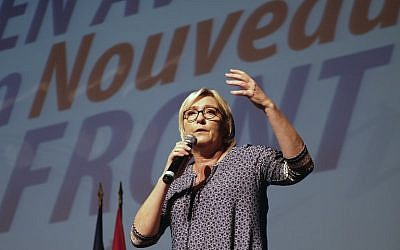 National Front party leader Marine Le Pen delivers a speech in Bruguieres,  France on September 23, 2017. (AFP Photo/Pool/Eric Cabanis)