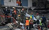 Israeli rescue workers look for survivors in Mexico City on September 23, 2017, four days after the powerful quake that hit central Mexico. (AFP Photo/Pedro Pardo)