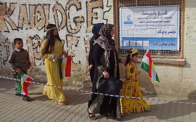 Iraqi Kurds arrive at a polling station to cast their votes in the Kurdish independence referendum in the city of Kirkuk in northern Iraq, on September 25, 2017. (AFP Photo/Marwan Ibrahim) Iraqi Kurds arrive at a polling station to cast their votes in the Kurdish independence referendum in the city of Kirkuk in northern Iraq, on September 25, 2017. (AFP Photo/Marwan Ibrahim)