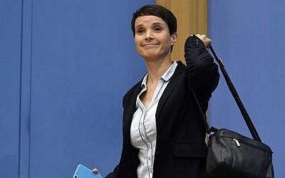 AfD co-leader Frauke Petry leaves a press conference for the nationalist party on September 25, 2017, in Berlin, where she said she refused to join the AfD parliamentary group. (AFP Photo/John Macdougall)