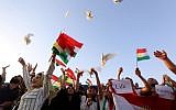 Iraqi Kurds release doves during in a demonstration at Irbil airport, in the capital of Iraq's autonomous northern Kurdish region, after the central government ordered the indefinite halt to all foreign flights to and from Iraqi Kurdistan on September 29, 2017. (AFP Photo/Safin Hamed)