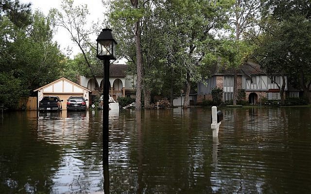 Homes surrounded by floodwaters September 3, 2017, in Houston, Texas. (Justin Sullivan/Getty Images/AFP) Homes surrounded by floodwaters September 3, 2017, in Houston, Texas. (Justin Sullivan/Getty Images/AFP)