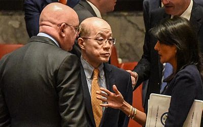 US Ambassador to the UN, Nikki Haley, right, speaks on the sidelines with Chinese Ambassador Liu Jieyi, center, and with Russian Ambassador Vasilly Nebenzia after a United Nations Security Council meeting on North Korea in New York City, September 4, 2017. (Stephanie Keith/Getty Images/AFP)