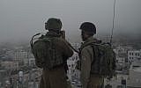 Illustrative: IDF soldiers conduct raids in the West Bank on September 27, 2017. (Israel Defense Forces)