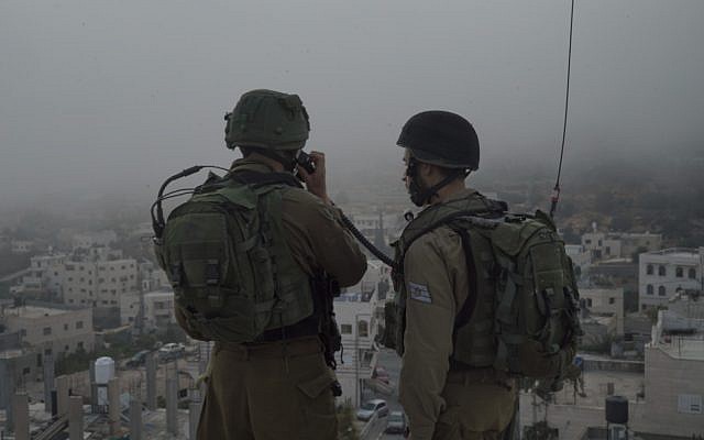 Illustrative: IDF soldiers conduct raids in the West Bank on September 27, 2017. (Israel Defense Forces) Illustrative: IDF soldiers conduct raids in the West Bank on September 27, 2017. (Israel Defense Forces)