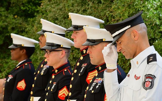 Israeli and US servicemen holding a moment of silence for the victims of 9/11 at a memorial outside Jerusalem on September 11, 2017. (Rafi Ben Hakoon) Israeli and US servicemen holding a moment of silence for the victims of 9/11 at a memorial outside Jerusalem on September 11, 2017. (Rafi Ben Hakoon)