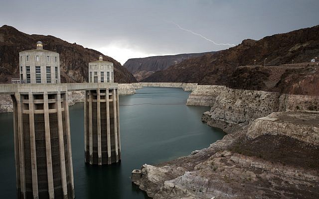 Lightning strikes over Lake Mead near Hoover Dam at the Lake Mead National Recreation Area in Arizona, July 28, 2014. (AP Photo/John Locher, File) Lightning strikes over Lake Mead near Hoover Dam at the Lake Mead National Recreation Area in Arizona, July 28, 2014. (AP Photo/John Locher, File)