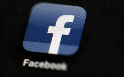 In this May 16, 2012, photo the Facebook logo is displayed on an iPad in Philadelphia. (AP Photo/Matt Rourke, File)
