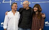 Director Samuel Maoz, center, and actors Lior Ashkenazi, left, and Sarah Adler pose during the photo call for the film "Foxtrot" at the 74th Venice Film Festival in Venice, Italy, Saturday, Sept. 2, 2017. (AP Photo/Domenico Stinellis)