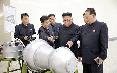 An undated image distributed by the North Korean government on September 3, 2017, shows North Korean leader Kim Jong Un at an undisclosed location. North Korea’s state media said Kim inspected a hydrogen bomb. (Korean Central News Agency/Korea News Service via AP)