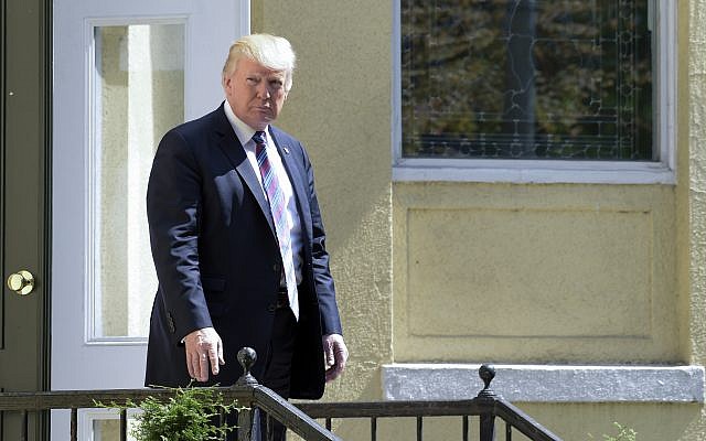 US President Donald Trump leaves after attending services at St. John's Church in Washington, Sunday, Sept. 3, 2017. (AP Photo/Susan Walsh) US President Donald Trump leaves after attending services at St. John's Church in Washington, Sunday, Sept. 3, 2017. (AP Photo/Susan Walsh)