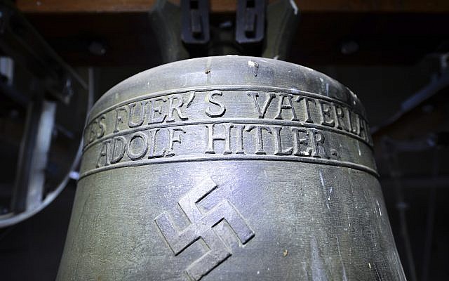 In this May 19, 2017 photo a church bell with the inscription 'Everything for the fatherland Adolf Hitler' and a swastika is pictured in the town church in Herxheim am Berg, western Germany. (Uwe Anspach/dpa via AP, file) In this May 19, 2017 photo a church bell with the inscription 'Everything for the fatherland Adolf Hitler' and a swastika is pictured in the town church in Herxheim am Berg, western Germany. (Uwe Anspach/dpa via AP, file)