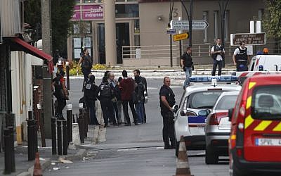 French police officers outside a building in Villejuif, south of Paris, September 6, 2017. (AP Photo/Christophe Ena)