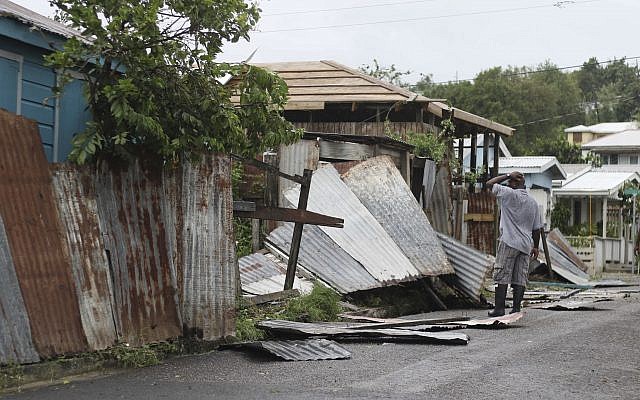 A man surveys the wreckage on his property after the passing of Hurricane Irma, in St. John's, Antigua and Barbuda, Wednesday, Sept. 6, 2017. (AP/Johnny Jno-Baptiste) A man surveys the wreckage on his property after the passing of Hurricane Irma, in St. John's, Antigua and Barbuda, Wednesday, Sept. 6, 2017. (AP/Johnny Jno-Baptiste)