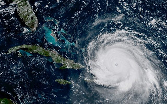 This geocolor GOES-16 satellite image taken Thursday, Sep. 7, 2017, at 11;15 a.m. EDT, shows the eye Hurricane Irma just north of the island of Hispaniola. (NOAA-NASA via AP) This geocolor GOES-16 satellite image taken Thursday, Sep. 7, 2017, at 11;15 a.m. EDT, shows the eye Hurricane Irma just north of the island of Hispaniola. (NOAA-NASA via AP)
