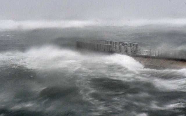A rough surf surrounds Boynton Beach inlet as Hurricane Irma hits in Boynton Beach, Florida. (Jim Rassol/South Florida Sun-Sentinel via AP) A rough surf surrounds Boynton Beach inlet as Hurricane Irma hits in Boynton Beach, Florida. (Jim Rassol/South Florida Sun-Sentinel via AP)