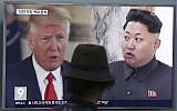 A man watches a television screen showing US President Donald Trump and North Korean leader Kim Jong Un during a news program at the Seoul Train Station in Seoul, South Korea, August 10, 2017. (AP Photo/Ahn Young-joon, File)