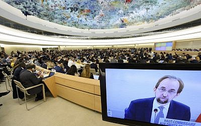 Zeid Ra'ad Al Hussein, UN high commissioner for human rights, is pictured on a TV screen during the opening of the 36th session of the Human Rights Council in Geneva on September 11, 2017. (Laurent Gillieron/ Keystone via AP)