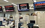 TV monitors show the J-Alert (warning siren) at an office of Kyodo News in Tokyo Friday, Sept. 15, 2017. South Korea's military said North Korea fired an unidentified missile Friday from its capital Pyongyang that flew over Japan before landing in the northern Pacific Ocean. (Toshiyuki Kuwana/Kyodo News via AP)