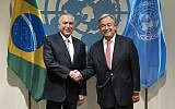 Brazilian President Michel Temer, left, is greeted by United Nations Secretary-General Antonio Guterres before a meeting Tuesday, Sept. 19, 2017, at UN headquarters. (AP Photo/Craig Ruttle)