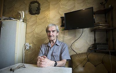 Former Soviet missile defense forces officer Stanislav Petrov poses, at his home in Fryazino, Moscow region, Russia, on August 27, 2015. (AP Photo/Pavel Golovkin/File)