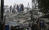 Volunteers search a building that collapsed after an earthquake, in the Roma neighborhood of Mexico City, Tuesday, September 19, 2017. (AP/Eduardo Verdugo)