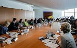 German Chancellor Angela Merkel, fifth from left, leads the last cabinet of the German government ahead of Germany's general elections at the chancellery in Berlin, Wednesday, Sept. 20, 2017. (AP/Markus Schreiber)
