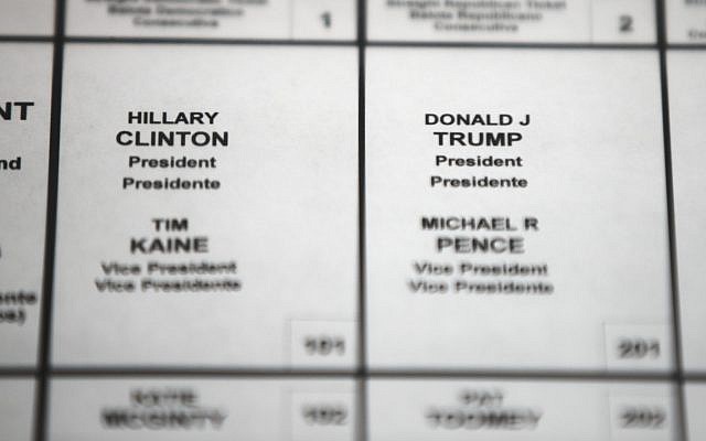 File photo from October 14, 2016, shows Democratic presidential candidate Hillary Clinton's and Republican presidential candidate Donald Trump's names printed on a ballot on a voting machine to be used in the upcoming election, in Philadelphia. (AP/Matt Rourke, File) File photo from October 14, 2016, shows Democratic presidential candidate Hillary Clinton's and Republican presidential candidate Donald Trump's names printed on a ballot on a voting machine to be used in the upcoming election, in Philadelphia. (AP/Matt Rourke, File)