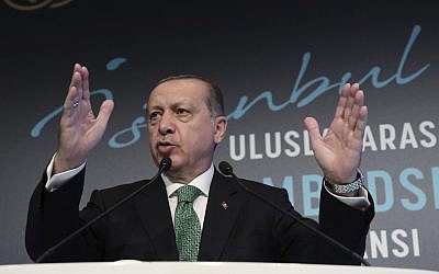 Turkish President Recep Tayyip Erdogan speaks during a meeting in Istanbul, Monday, Sept. 25, 2017. (Pool photo via AP)