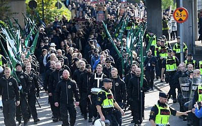 Members of the Nordic Resistance Movement march in central Gothenburg, Sweden, September 30, 2017. (Fredrik Sandberg/TT via AP)