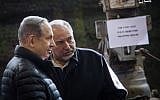 Then-Defense Minister Avigdor Liberman (R) and Prime Minister Benjamin Netanyahu visit the IDF's West Bank Division, near the Israeli settlement of Beit El, on January 10, 2017. (Hadas Parush/Flash90)