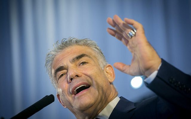 Yesh Atid party leader Yair Lapid attends a ceremony for new immigrants from North America at Ben Gurion airport in central Israel on August 15, 2017. (Miriam Alster/Flash90) Yesh Atid party leader Yair Lapid attends a ceremony for new immigrants from North America at Ben Gurion airport in central Israel on August 15, 2017. (Miriam Alster/Flash90)