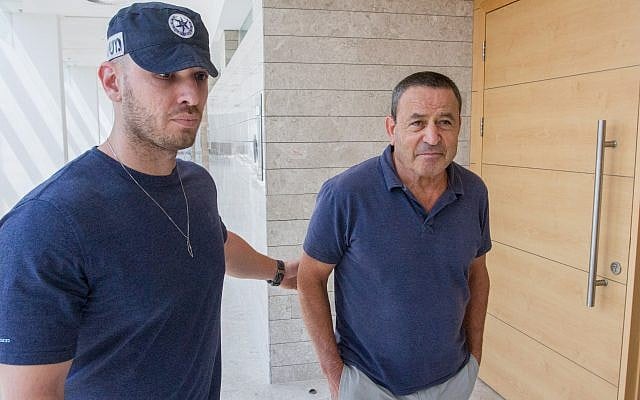 IDF Brig. Gen. (res.) Shay Brosh, right,, is brought for a court hearing at the Rishon Letzion Magistrate's Court September 4, 2017. (Flash90) IDF Brig. Gen. (res.) Shay Brosh, right,, is brought for a court hearing at the Rishon Letzion Magistrate's Court September 4, 2017. (Flash90)