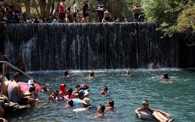 Israelis swim at Gan HaShlosha National Park (also known as Sachne) in northern Israel, September 9, 2017. (Gili Yaari/Flash90)