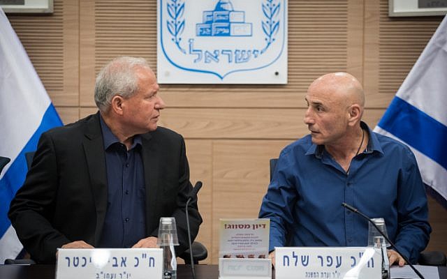 Foreign Affairs and Defense Committee chairman MK Avi Dichter, left, and chair of the Defense Outlook and Force-Building Subcommittee MK Ofer Shelah speak at a meeting presenting a report on the military's five-year Gideon Plan to the public, at the Knesset, on September 25, 2017. (Hadas Parush/Flash90) Foreign Affairs and Defense Committee chairman MK Avi Dichter, left, and chair of the Defense Outlook and Force-Building Subcommittee MK Ofer Shelah speak at a meeting presenting a report on the military's five-year Gideon Plan to the public, at the Knesset, on September 25, 2017. (Hadas Parush/Flash90)