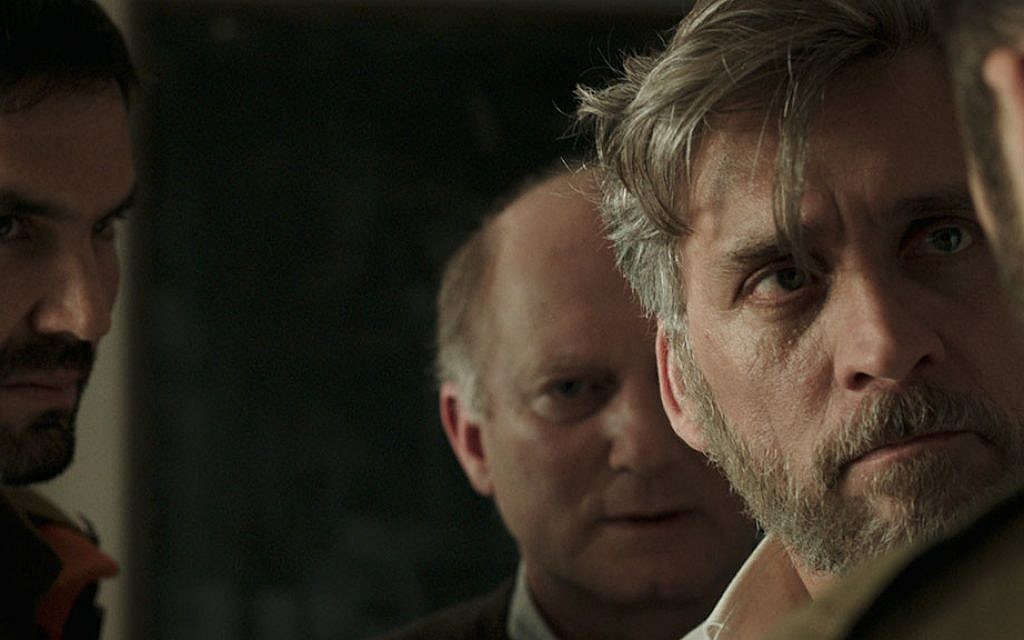 Lior Ashkenazi (foreground), stars as a grieving father in Samuel Maoz's award-winning film 'Foxtrot' (Courtesy 'Foxtrot') Lior Ashkenazi (foreground), stars as a grieving father in Samuel Maoz's award-winning film 'Foxtrot' (Courtesy 'Foxtrot')