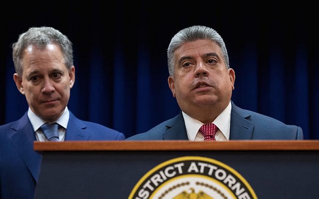 (L to R) New York State Attorney General Eric Schneiderman looks on as Acting Brooklyn Attorney General Eric Gonzalez speaks during a press conference to call for an end of Immigration and Customs Enforcement (ICE) raids in New York state courts, August 3, 2017 in the Brooklyn borough of New York City. (Drew Angerer/Getty Images via JTA) (L to R) New York State Attorney General Eric Schneiderman looks on as Acting Brooklyn Attorney General Eric Gonzalez speaks during a press conference to call for an end of Immigration and Customs Enforcement (ICE) raids in New York state courts, August 3, 2017 in the Brooklyn borough of New York City. (Drew Angerer/Getty Images via JTA)
