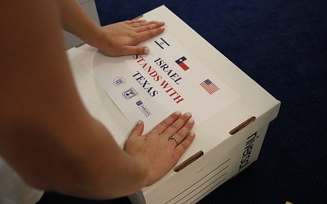 Staff members at the Israeli Embassy in Washington, D.C. pack items to aid victims of Hurricane Harvey in Houston, Texas. (Courtesy) Staff members at the Israeli Embassy in Washington, D.C. pack items to aid victims of Hurricane Harvey in Houston, Texas. (Courtesy)