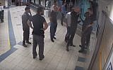 Screen capture from video of a group of men confronting security guards in the ER unit of Ichilov Hospital, Tel Aviv, September 27, 2017. (YouTube/Times of Israel)