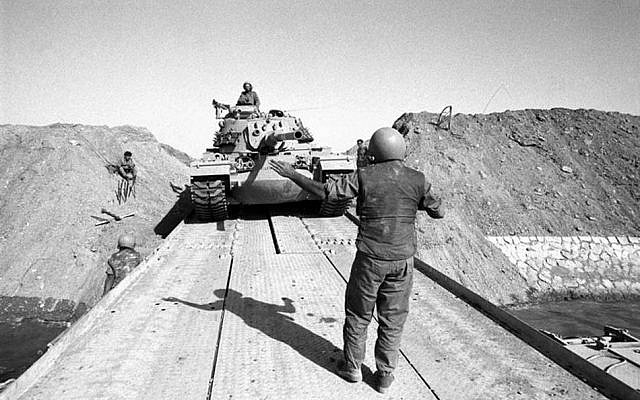 An Israeli tank crosses the Suez Canal (Israel Defense Forces Archive)