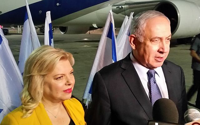 Prime Minister Benjamin Netanyahu and his wife Sara speak to reporters before boarding the plane to Latin America for a 10-day state trip, on September 10, 2017. (Raphael Ahren/Times of Israel) Prime Minister Benjamin Netanyahu and his wife Sara speak to reporters before boarding the plane to Latin America for a 10-day state trip, on September 10, 2017. (Raphael Ahren/Times of Israel)