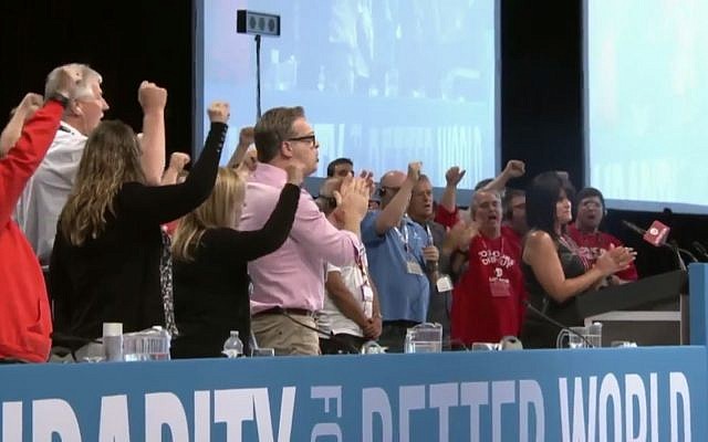 Delegates at Unifor Canadian Council, for Canada's largest private sector union, cheer on August 23, 2017. (Screen capture: YouTube) Delegates at Unifor Canadian Council, for Canada's largest private sector union, cheer on August 23, 2017. (Screen capture: YouTube)