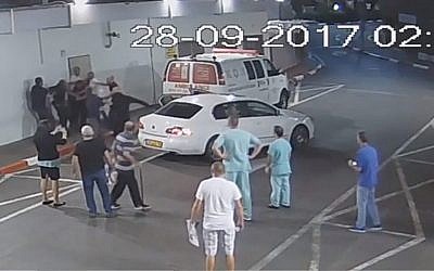 An altercation between security guards and the family of a patient is seen outside the Ichilov Hospital ER, June 27, 2017 (Security camera footage/Courtesy Ichilov Hospital)