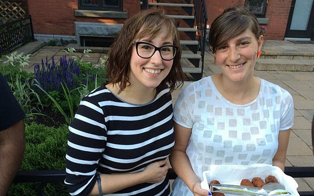 Katherine Romanow, left, creator of the Beyond the Bagel walking food tour by the Museum of Jewish Montreal. (Robert Sarner/Times of Israel)