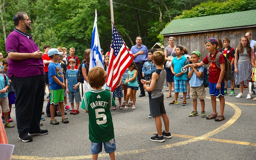 Illustrative: Scott Sokol, head of school at MetroWest Jewish Day School in Framingham, Massachusetts, leads morning circle, one of several camp-like elements the school has adopted. (Courtesy of MetroWest Jewish Day School/via JTA) Illustrative: Scott Sokol, head of school at MetroWest Jewish Day School in Framingham, Massachusetts, leads morning circle, one of several camp-like elements the school has adopted. (Courtesy of MetroWest Jewish Day School/via JTA)