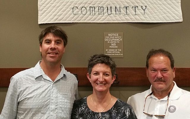 From left: Whitefish Mayor John Muhlfeld, Rabbi Francine Green Roston and Paul Goldenberg, the director of Secure Community Network, August 25, 2017. The Jewish community in the Montana city was subjected to an onslaught of anti-Semitic harassment over the past year. (Courtesy of Goldenberg/via JTA)