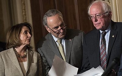 From left to right: House Minority Leader Nancy Pelosi, Senate Minority Leader Charles Schumer and Sen. Bernie Sanders at a Capitol Hill news conference, May 25, 2017. (Drew Angerer/Getty Images)