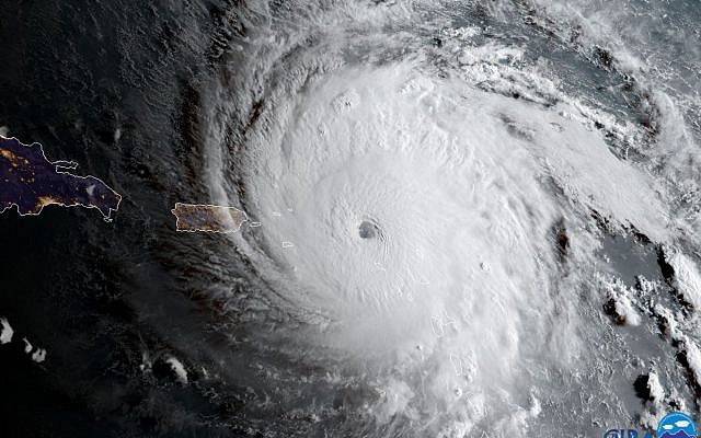 In this geocolor image captured by GOES-16 and released by the National Oceanic and Atmospheric Administration (NOAA), Hurricane Irma approaches Anguilla on September 6, 2017. (NOAA via AP)