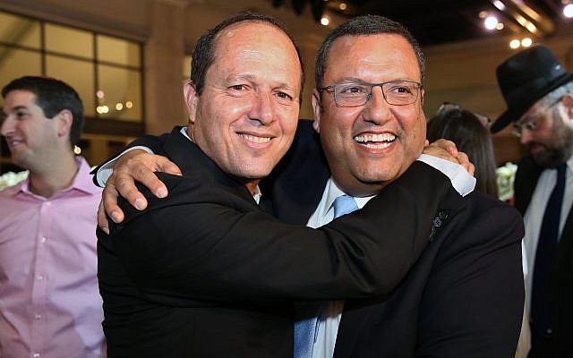 Moshe Lion (R) seen with Jerusalem mayor Nir Barkat, during the wedding of Lion's daughter in Neve Ilan, June 19, 2016. (Yaakov Cohen/Flash90) Moshe Lion (R) seen with Jerusalem mayor Nir Barkat, during the wedding of Lion's daughter in Neve Ilan, June 19, 2016. (Yaakov Cohen/Flash90)