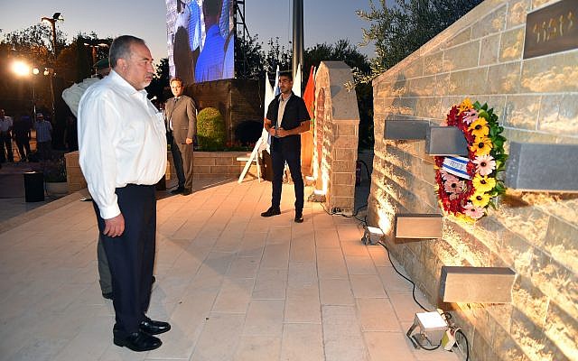 Defense Minister Avigdor Liberman lays a wreath at a monument commemorating the contributions of Bedouin soldiers to Israel's security in the Galilee on September 11, 2017. (Ariel Hermoni/Defense Ministry) Defense Minister Avigdor Liberman lays a wreath at a monument commemorating the contributions of Bedouin soldiers to Israel's security in the Galilee on September 11, 2017. (Ariel Hermoni/Defense Ministry)